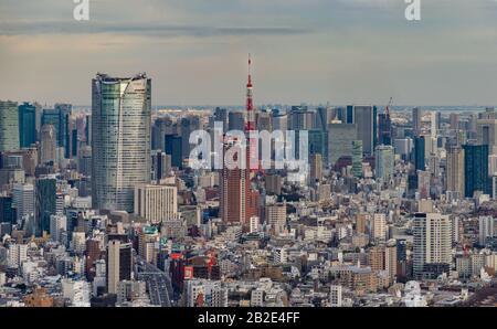 A picture of the Tokyo Tower and its surrounding cityscape. Stock Photo