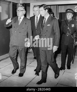 Prince Charles Prince of Wales leaving London's Heathrow Airport escorted by British Airways chairman Lord King and BAA PLC chairman Sir John Egan in 1988. Stock Photo