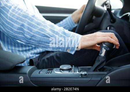 Gear automatic transmission, driving automobile concept. , close up, side view. Stock Photo