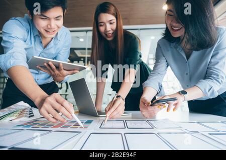 Programmer and UX UI designer working in a software development and coding technologies. Mobile and website design and programing development technolo Stock Photo