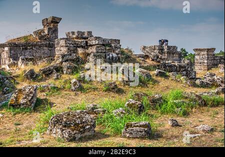 The ruins of the ancient city of Hierapolis in Pamukkale, Turkey, on a sunny summer day Stock Photo