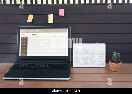 2018 Calendar Event Planner is busy. Businesswoman always Planning Agenda and Schedule using calendar,clock to set timetable organize schedule. Woman Stock Photo