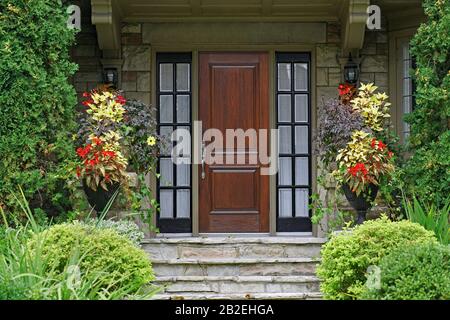 Old stone house wooden door Stock Photo - Alamy