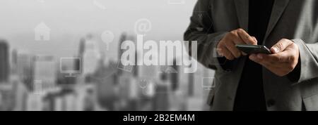 man use digital phone  typing on phone tablet smartphone Searching Browsing Internet internet of things (IoT) Stock Photo