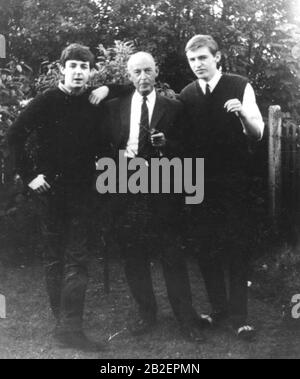 Circa 1960 - Liverpool, England, United Kingdom - The McCartney family from left, PAUL, the Beatles singer and songwriter, with his father JIM and brother MIKE in the garden of their home at 20 Forthlin Rd. (Credit Image: Keystone Press Agency/Keystone USA via ZUMAPRESS.com) Stock Photo