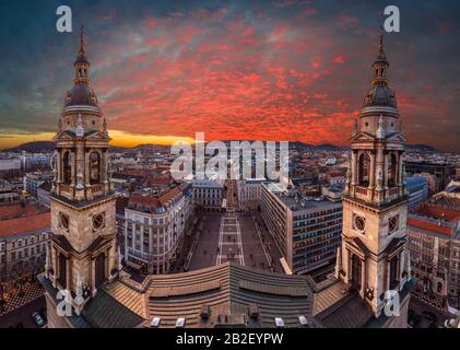 Budapest, Hungary - Amazing dramatic sunset over Budapest taken from the top of St.Stephen's Basilica. The view includes two towers of basilica, St.St Stock Photo