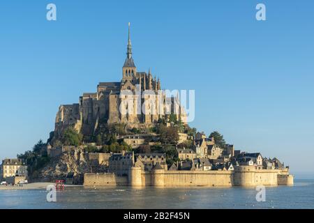 Early morning over the water at Mont Saint Michel, Normandy, France Stock Photo