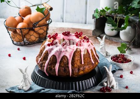 Easter cake. Bundt cake. easter concept. panettone. still life of food, easter day, spring food, cake with berries, brioche. Stock Photo