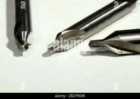 Macro of three center hole drills isolated on a white background.. Stock Photo