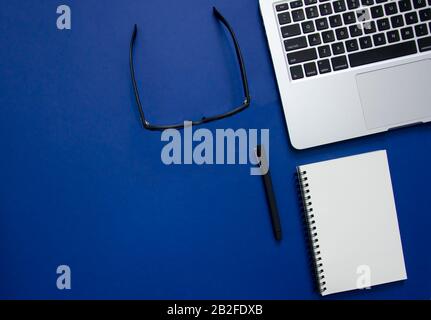 Flat lay stationery with blue background Stock Photo