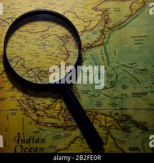 Magnifying glass on China map Stock Photo