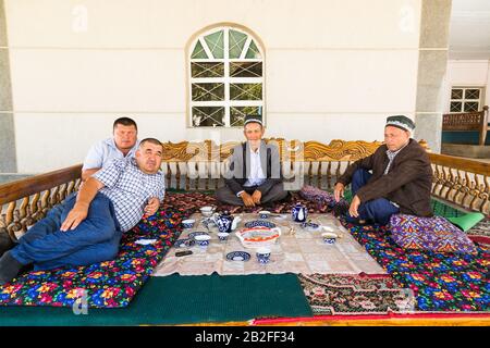 Local man at restaurant, M39 road, Qashqadaryo Region, Uzbekistan, Central Asia, Asia Stock Photo