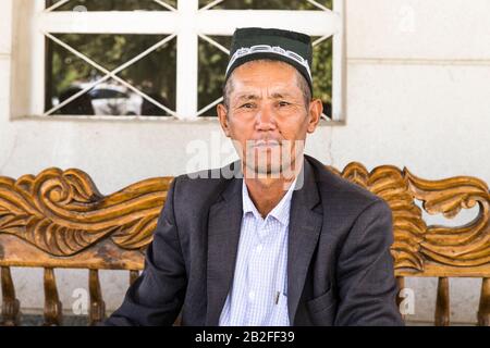 Local man at restaurant, M39 road, Qashqadaryo Region, Uzbekistan, Central Asia, Asia Stock Photo