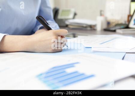 Architect drawing blueprints Beijing China Stock Photo