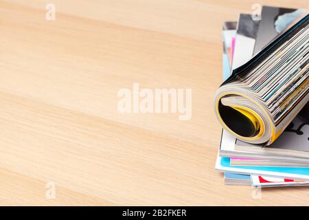 Close up stacking magazine place on table background Stock Photo