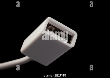 Female USB plug on a white cable, standard type A connector. Stock Photo