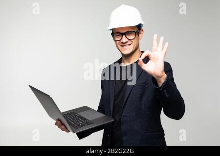 Portrait of an engineer using a laptop Stock Photo