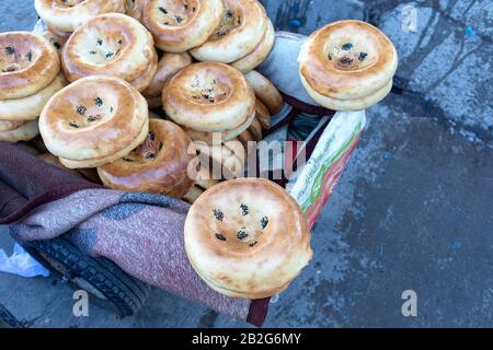 National uzbek bread sold in the market in bazaar, Uzbekistan, Central Asia Stock Photo