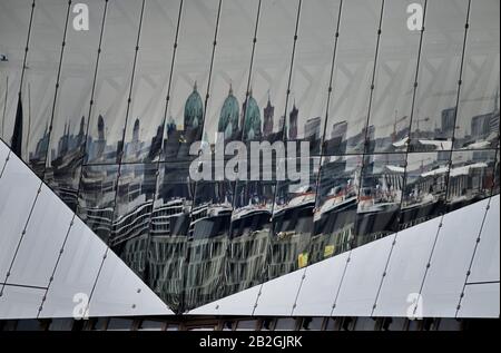 Berlin, Germany. 03rd Mar, 2020. The Berlin Cathedral and parts of the city are reflected in the facade of the Cube building in Berlin. Credit: Frank May/dpa/Alamy Live News Stock Photo