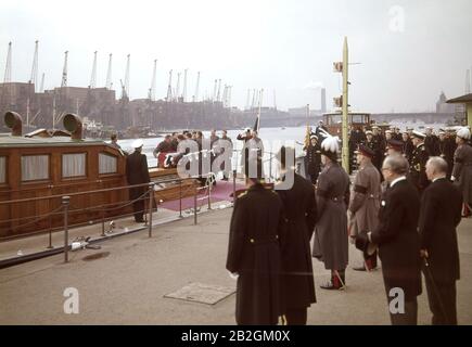 Sir Winston Churchill's coffin is carried aboard the Havengore, a ceremonial launch at Tower Pier in London. Stock Photo