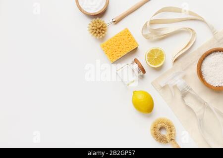 Vinegar, baking soda, salt, lemon and cloth on white Stock Photo