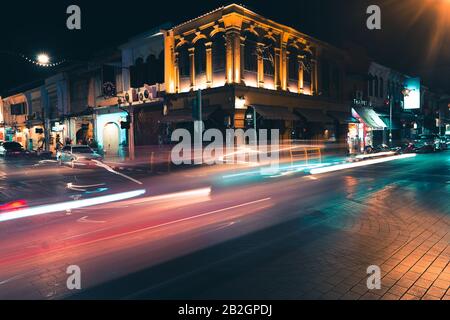 At night in the old town in Phuket Street lights and buildings Stock Photo