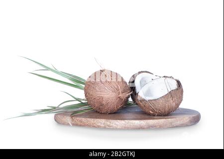 Coconut whole and two halves isolated on white Stock Photo