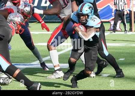 SEATTLE, WA - FEBRUARY 22: Dallas Renegades running back Cameron Artis-Payne  (34) looks up field after catching the ball during an XFL football game  between the Dallas Renegades and the Seattle Dragons