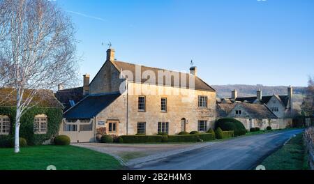 Manor farm house in the afternoon winter sunlight. Broadway, Cotswolds, Worcestershire, England Stock Photo