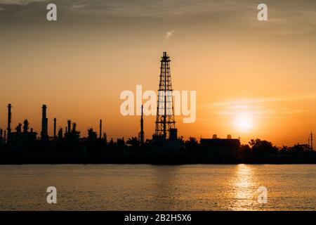 Oil refinery or petrochemical industry with ship in thailand. for Logistic Import Export background. Stock Photo