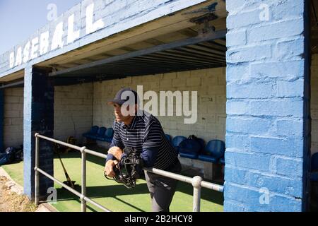 Baseball player looking away Stock Photo