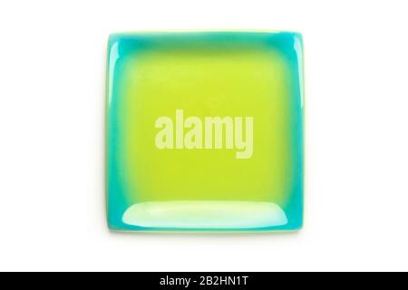 Ceramic dish of a square shape isolated on white Stock Photo