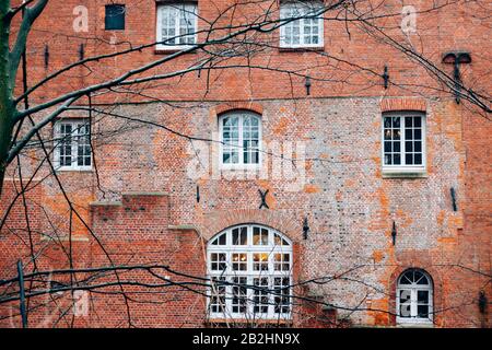 Brick wall of a medieval building Stock Photo