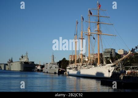 Sydney, Australia, the Esmeralda a four-masted barquentine tall ship of the Chilean Navy moored in sunshine at Cowper Wharf, Woolloomooloo Stock Photo