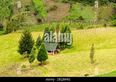 Small Farmhouse In The Ecuadorian Highlands Of Andes Mountains High Point Of View Stock Photo