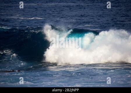 waves breaking crashing in the sea off the shoreline of Lanzarote canary islands spain Stock Photo