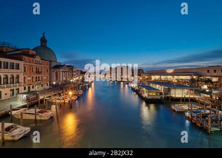 Panoramic sunset view. View of the Grand Canal from the Bridge of the Barefoot (Ponte degli Scalzi). Stock Photo