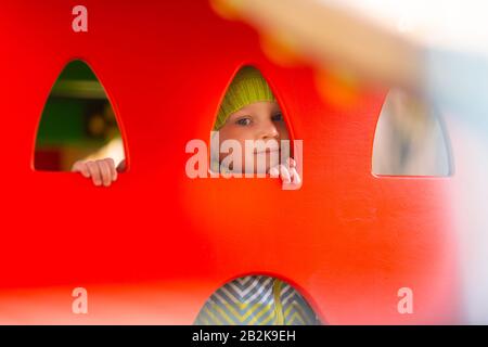 Happy little baby boy playing on the playground outdoor Stock Photo