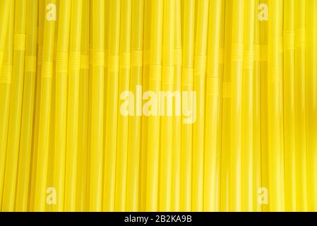 Straws plastic c background yellow screen many group plastic Stock Photo