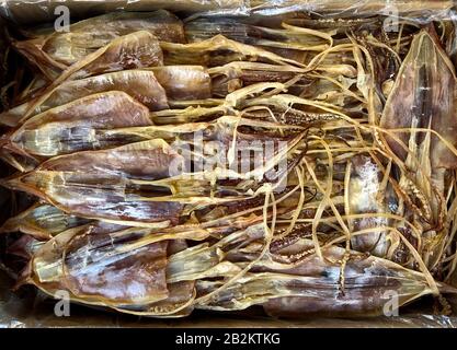 dried squid on food market in China, Dry seafood - Stock Photo