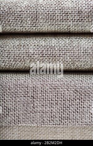Closeup of a fragment of a beige textile sofa in the room. Texture of expensive fabric on furniture. Sofa element couch couch room furniture Stock Photo