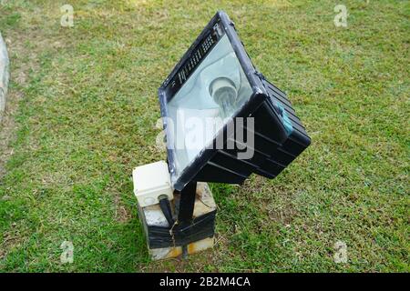 Dubai UAE - November 2019: Close up outdoor LED lamp on the yard. Large outdoor light for building coloring. LED flood light, spot light which lights Stock Photo