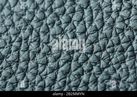 Green textured leather closeup. Full frame, close up. Macro Stock Photo