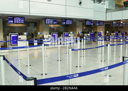 Empty check in desk at Duesseldorf airport Stock Photo