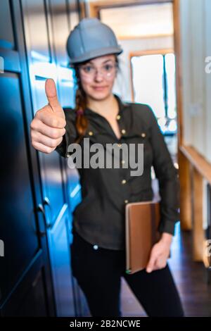Beautiful inspector woman wearing glasses holding checklist clipboard ...