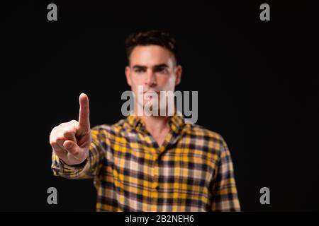 Caucasian man on black background Stock Photo