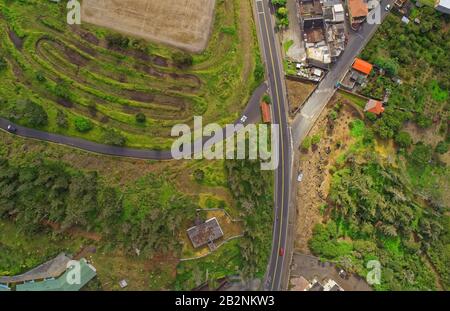 Aerial View Of Green Fields In Banos De Agua Santa Tungurahua Province In The Daylight South America Stock Photo