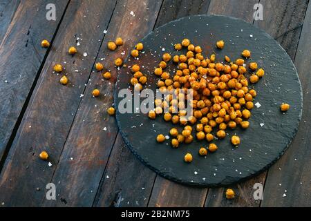 Crunchy and spicy oven-roasted chickpeas dish Stock Photo