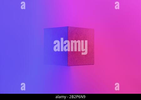 Geometric cube figure in vibrant neon colors. Faded blue and pink gradients, geometric shape, abstract concept Stock Photo