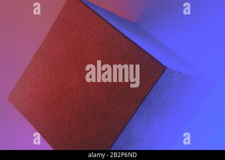 Geometric cube figure in vibrant neon colors. Faded blue and pink gradients, geometric shape, abstract concept Stock Photo
